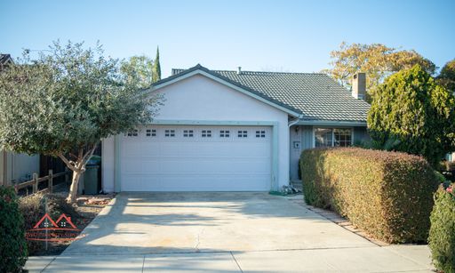 Front exterior of the single-family home at 2135 Hikido Drive, San Jose, with attached two-car garage