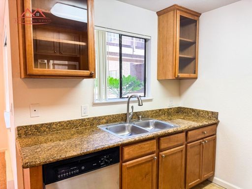 Upgraded kitchen with granite countertops and stainless steel appliances