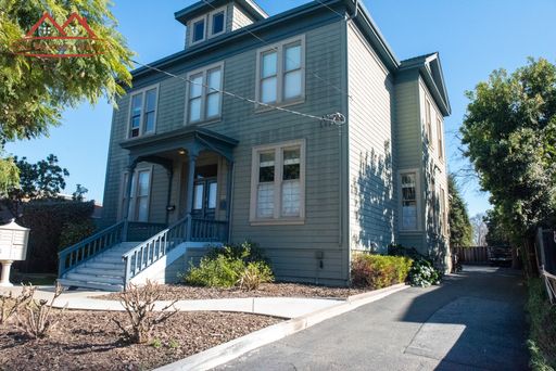 Front exterior of the Victorian building at 272 Washington Street, San Jose, with its front porch and driveway